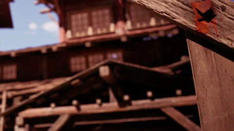Old wooden structure with cloudy sky in background during daylight Stock Footage 344885877