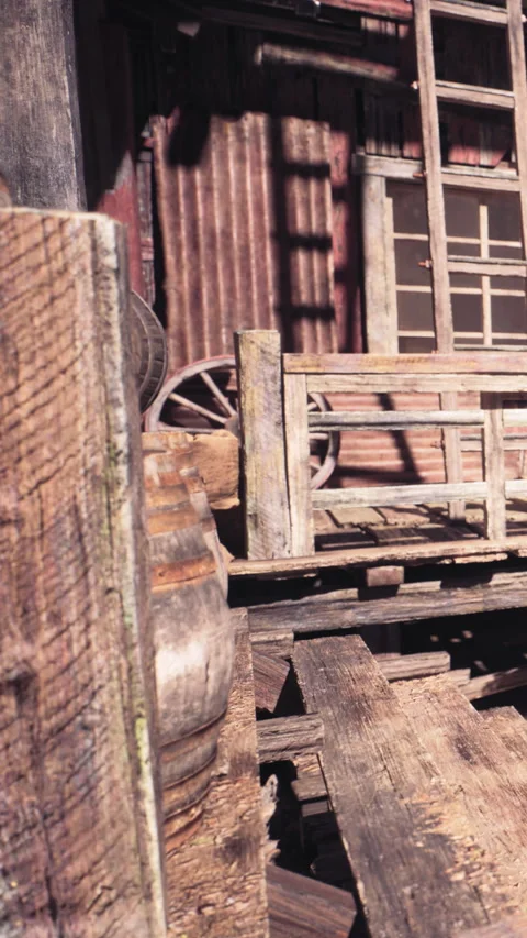 Old wooden structures at a rustic location during daylight hours Stock Footage 339042413