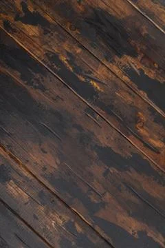 Old wooden surface background, scuffed boards with black paint stains. Stock Photos