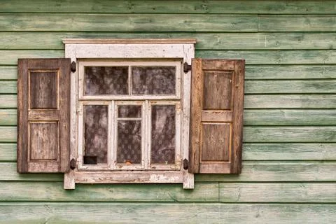 Old wooden wall with a window Stock Photos