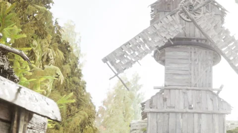 Old wooden windmill stands in the forest during a cloudy day Stock Footage 340023248