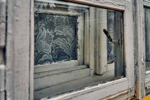 Old wooden window frames - a terrible mysterious apocalyptic view: an abandon Stock Photos
