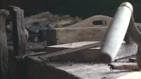 Old woodworking tools on dusty workbench in close up view Stock Footage 152121647