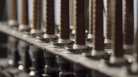 Old wool spindle and virgin wool weaving machinery Stock Footage 74510602