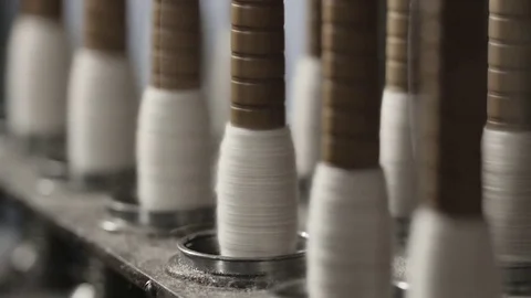 Old wool spindle and virgin wool weaving machinery Stock Footage 74510863