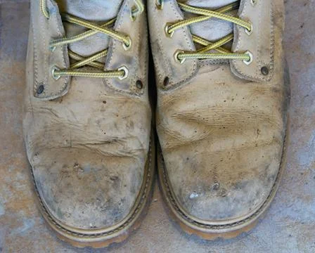 Old work boots, close-up Stock Photos