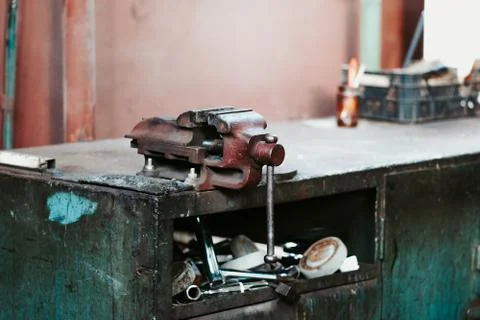 The old work table with the vise Stock Photos