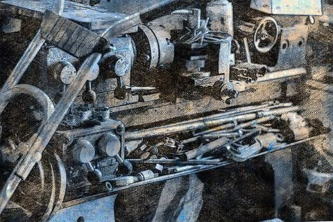 The old workshop. Close-up of a lathe with tools and a can of paint. Crafts. Stock Photos