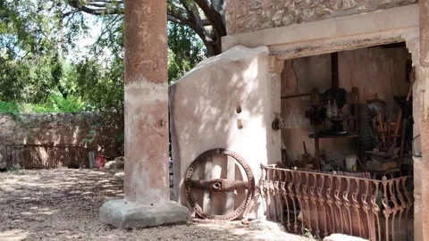 Old workshop with stone walls and antique tools in Polop Spain 스톡 동영상 317409156