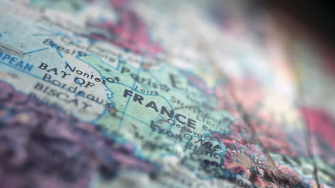 Old World Map Showing Closeup of France With Worn Surface and Colored Details 4K Stock Footage 307885944