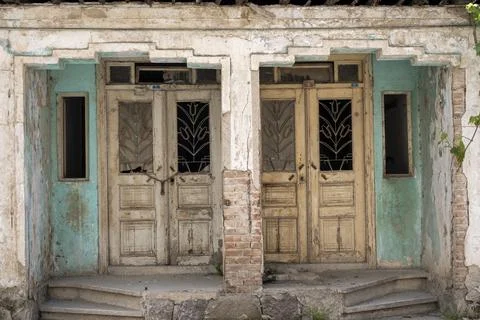  Old Worn and Abandoned Two Village House Doors Stock Photos