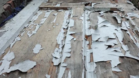 Old worn doors, paint peeling from the sun and rain. Stock Footage 218315706