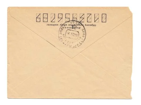 Old worn envelope with USSR meter stamp, worn and yellowed paper, closed, iso 库存照片