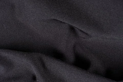 Old worn-out polyester and elastane fabric, pilling and frayed threads 写真素材