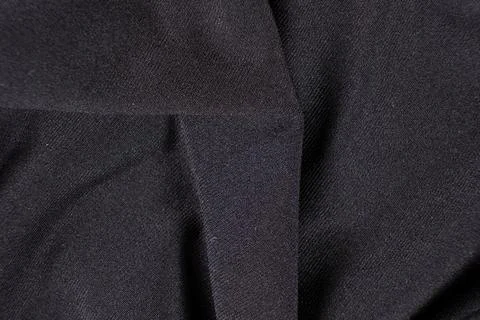 Old worn-out polyester and elastane fabric, pilling and frayed threads 写真素材
