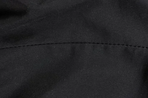 Old worn-out polyester and elastane fabric, pilling and frayed threads 写真素材