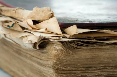 Old worn paper sheets of book Stock Photos