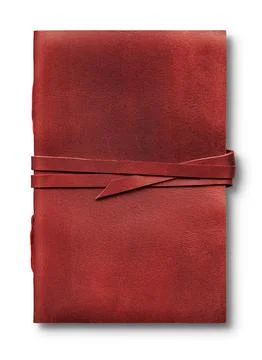 Old worn red leather notebook isolated on white background Stock-Fotos