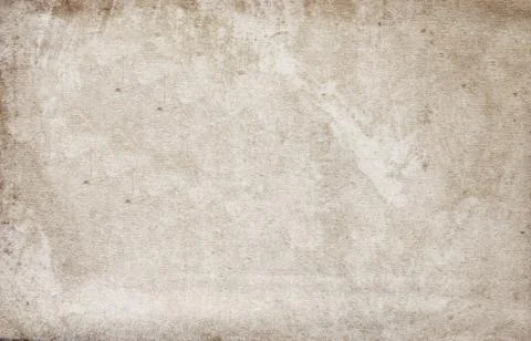 Old worn sand - colored paper with a dirty surface Stock Photos