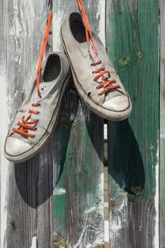 Old Worn Sneakers Фото