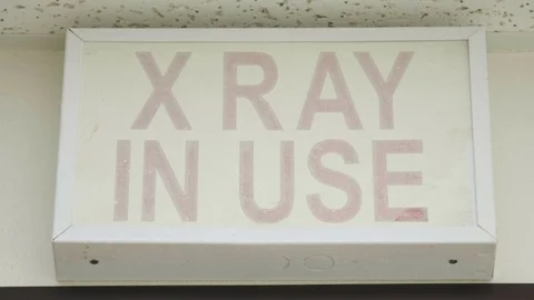 Old "X-Ray in use" sign in a hospital 動画素材 75059049