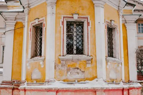 Old yellow building with window Stock Photos
