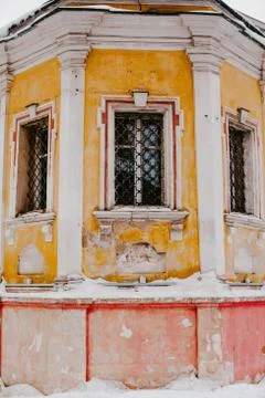 Old yellow building with window Stock Photos