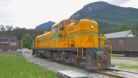 Old Yellow Diesel Cargo Train Locomotive Engine, Freight Railway Line Stock Footage 121472833