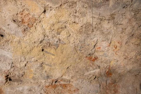 Old yellow stone wall background texture sandstone Stock Photos