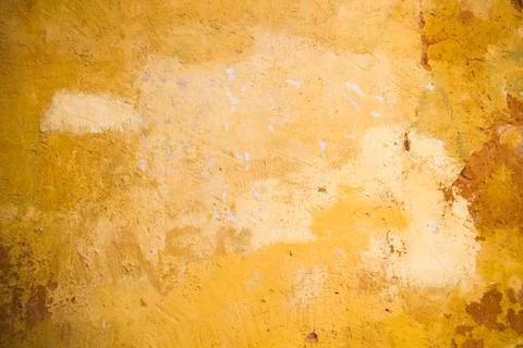 Old yellow wall background or texture Stock-Fotos