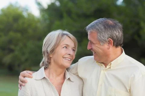 Older couple looking lovingly at each other 库存照片
