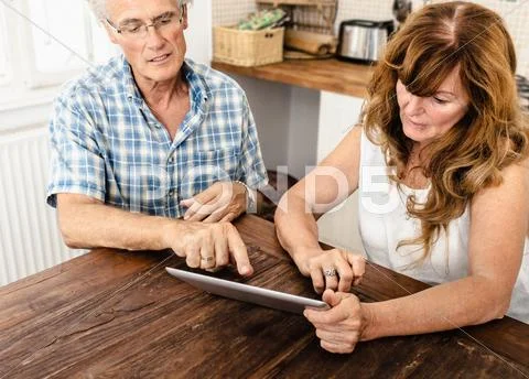 Older Couple Using Tablet Computer