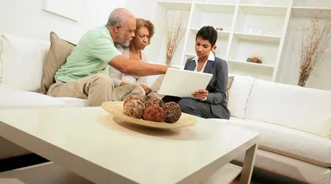 Older Ethnic Couple Meeting Financial Advisor Home Stock Footage