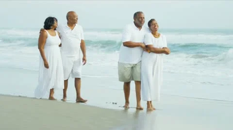 Older Ethnic Couples Walking Together Beach Stock Footage