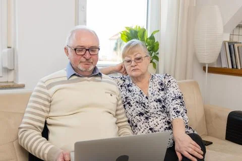 The older generation actively uses gadgets, whether for communication, work or Stock Photos