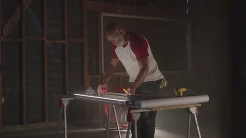 Older Guy Works Measuring On Table Stock Footage 270390630