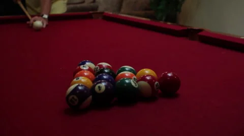 OLDER MAN BREAKS RACK OF BILLIARDS BALLS Stock Footage 53281054