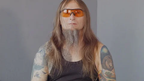 An older man does namaste Stock Footage 115432283