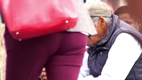 An older man eats a jelly. Stock Footage 98069916