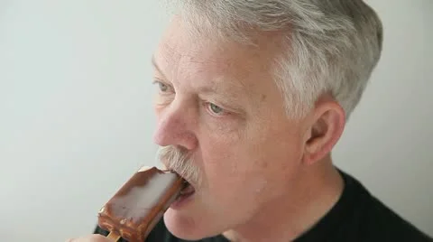 Older man with ice cream Stock Footage 22159345