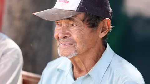 Older man looks at camera Stock Footage 95496632