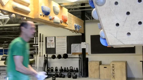 Older man training for rock climbing on a campus board 2. Stock-Footage 71445978