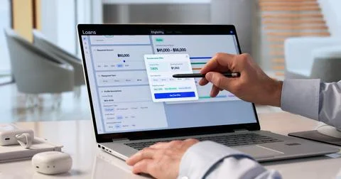 Older Man Uses Laptop Analyzing Personal Loan Eligibility Through Digital App Stock Photos