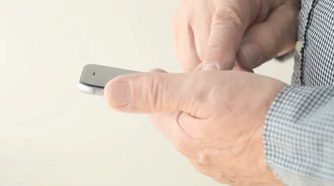 Older man using cellphone Stock Footage 54839469