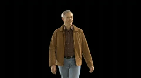 Older Man Walking Towards Camera Stock Footage 79893