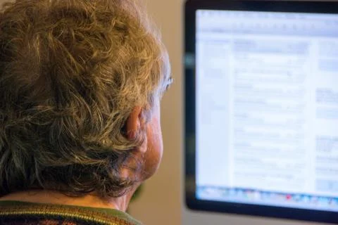 Older Man working on Computer Stock Photos
