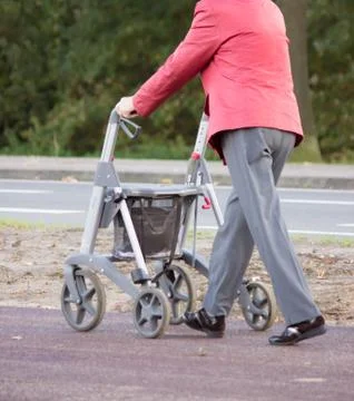 Older person with walker Stock Photos