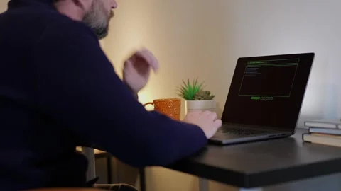 Older Systems Admin Restores Backup After Hack Stock Footage 326150341