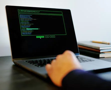 Older Systems Admin Restores Backup After Hack Stock Photos