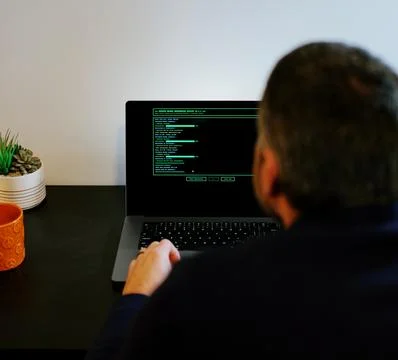 Older Systems Admin Restores Backup After Hack Foto stock